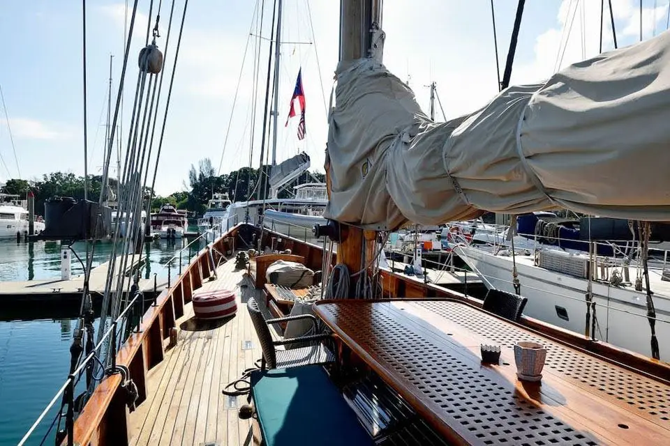 Rona's teak side deck looking forward in a marina