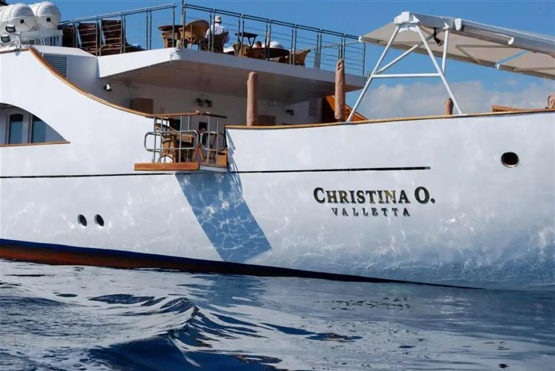Close view of the name CHRISTINA O lettered on the hull