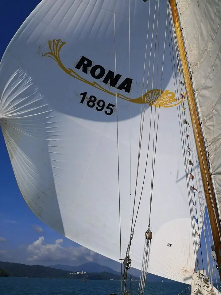Spinnaker bearing the name RONA and the date 1895