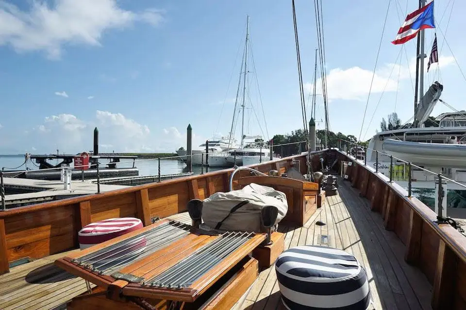Rona's teak deck looking forward from aft, alongside in a marina